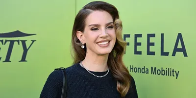 lana del rey announces album delay and title change, offers fans a new single